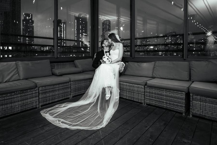 Night rooftop with flowing veil, black and white