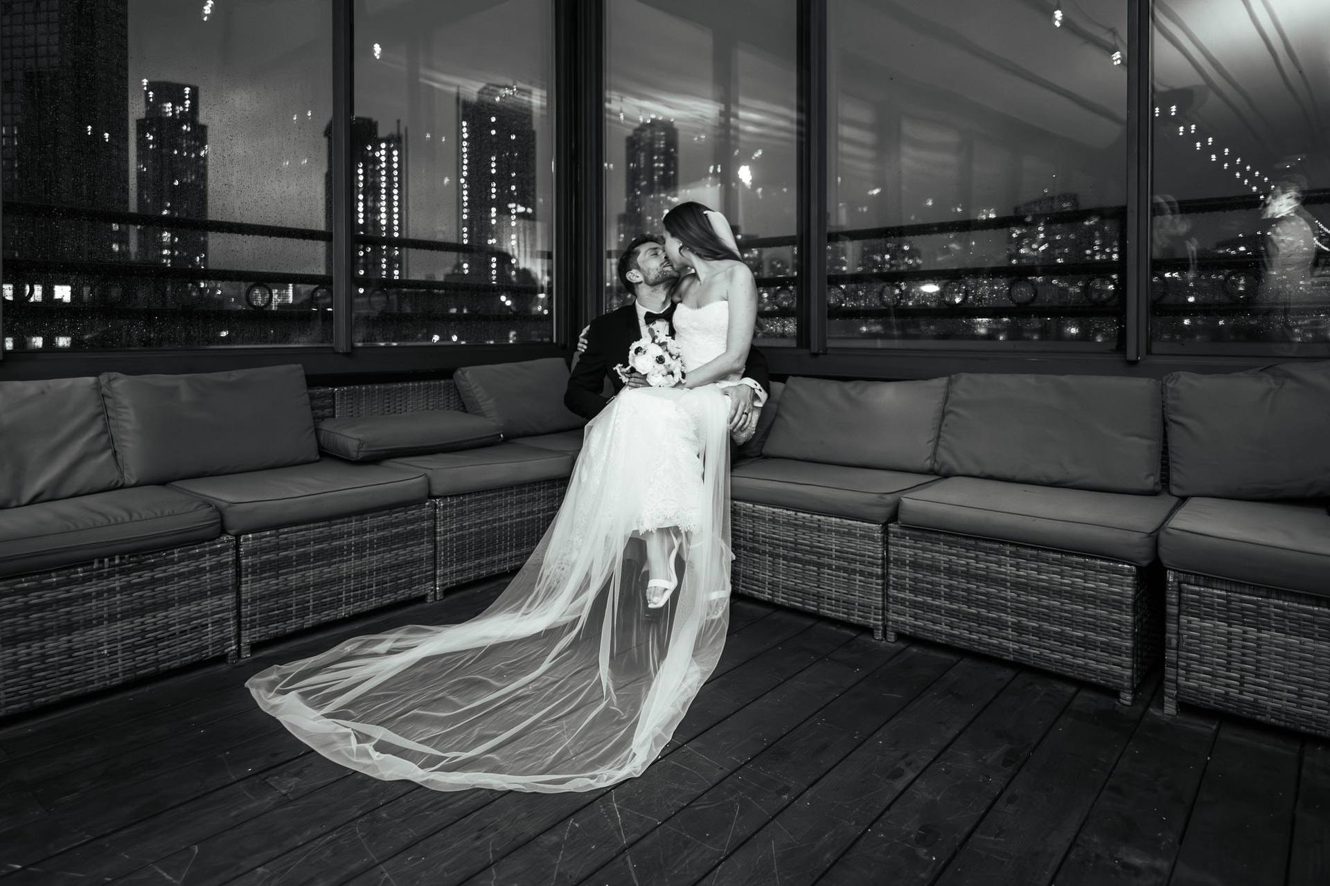 Night rooftop with flowing veil, black and white