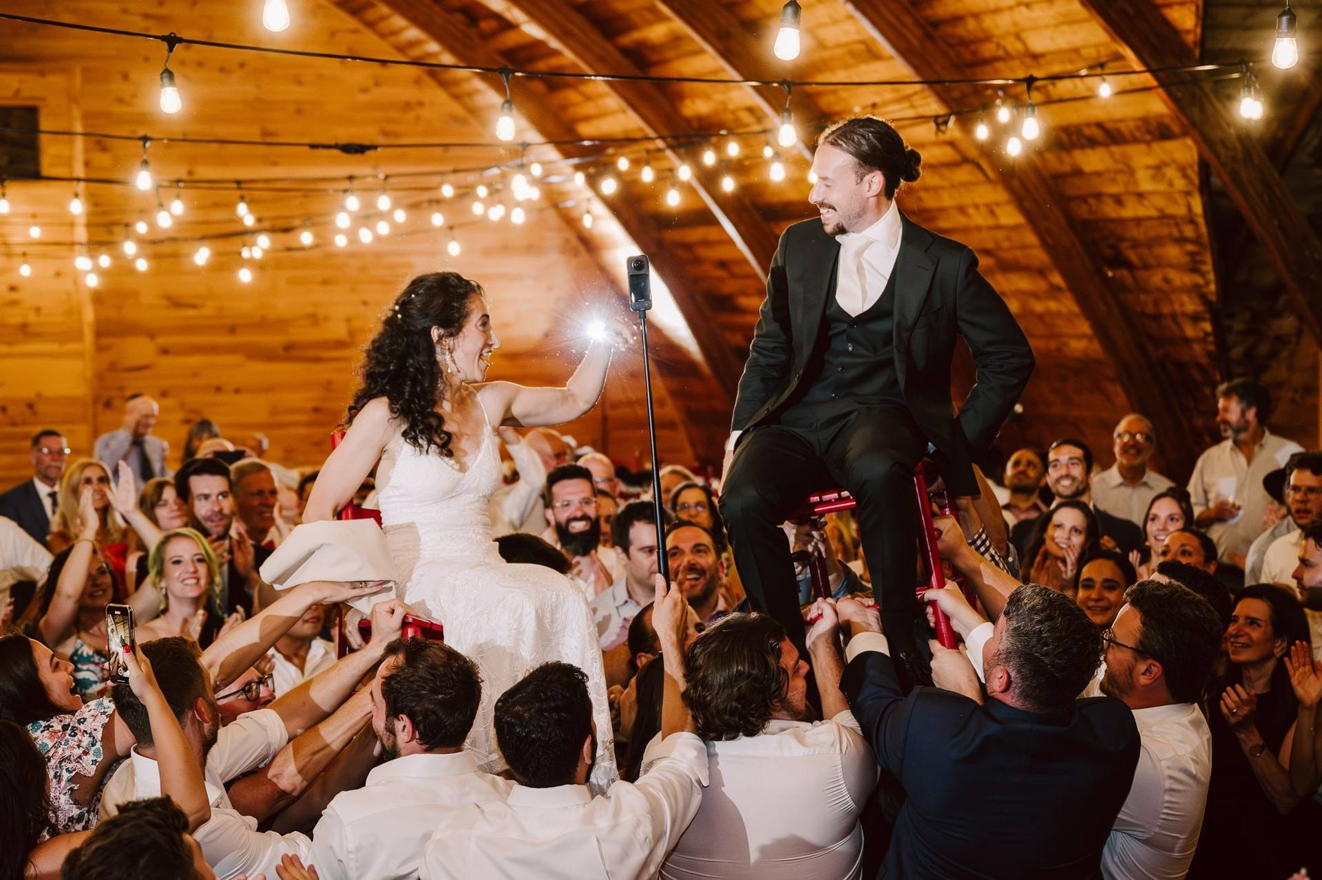 Hoisted on chairs for the hora