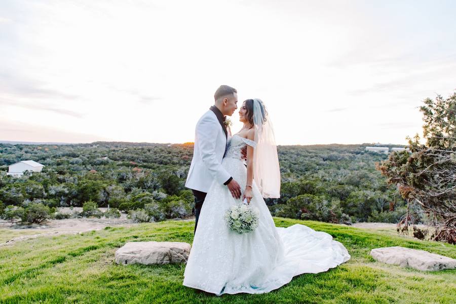 Couple overlooking the hill country at dusk