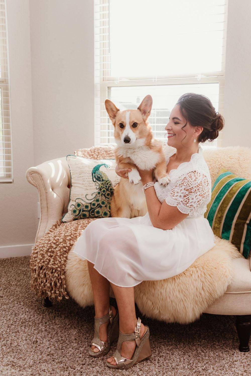 Bride at home with her corgi