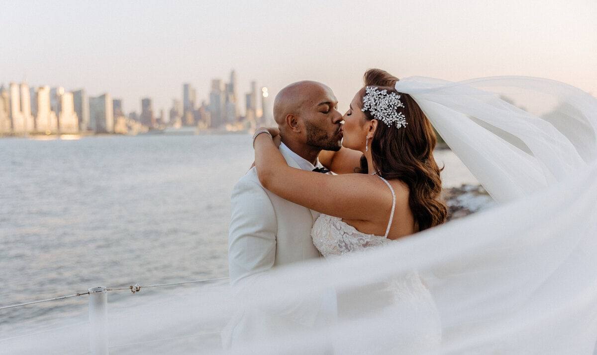 Veil sweeping across a skyline kiss