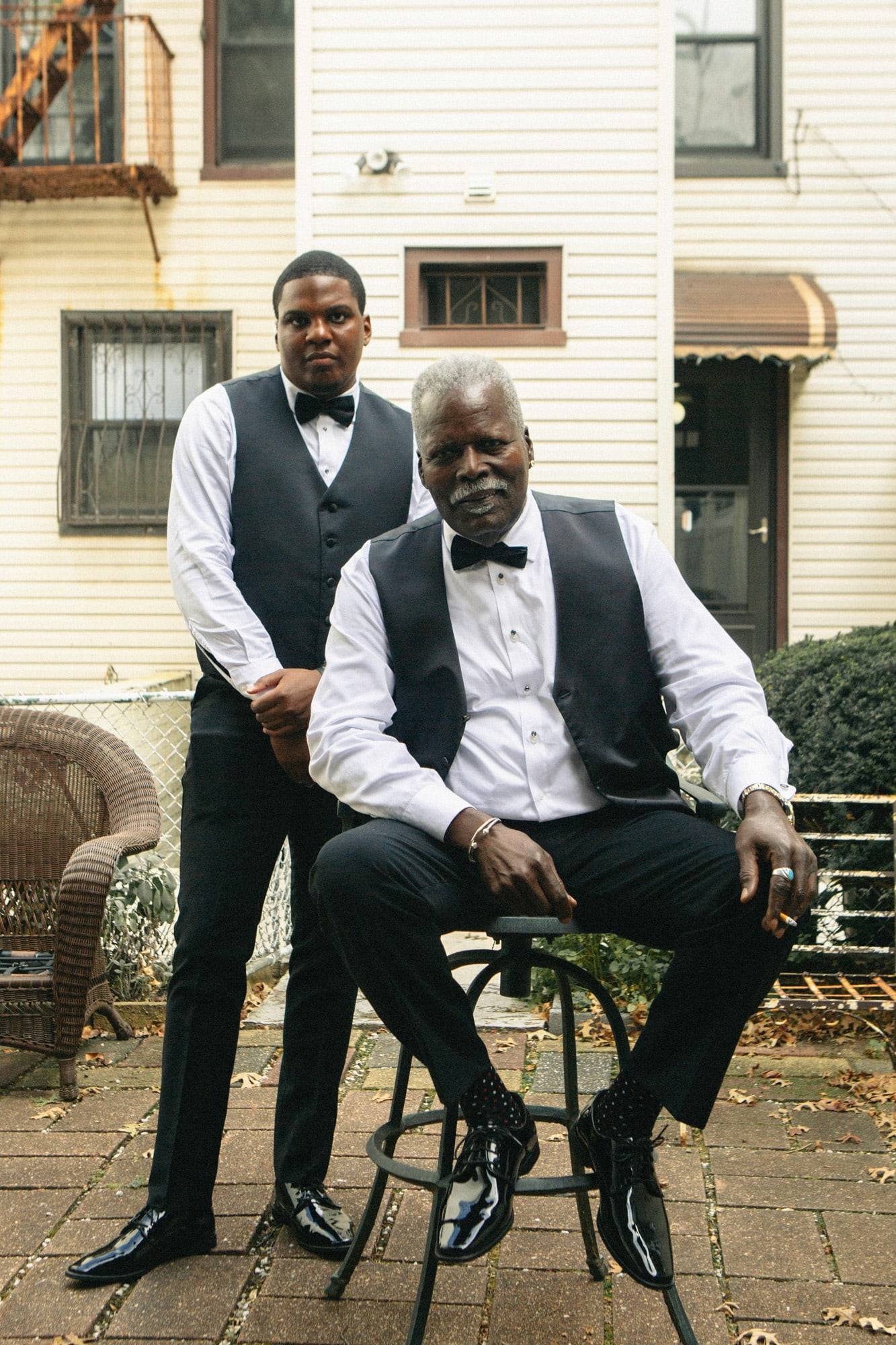 Couple seated on the brownstone stoop