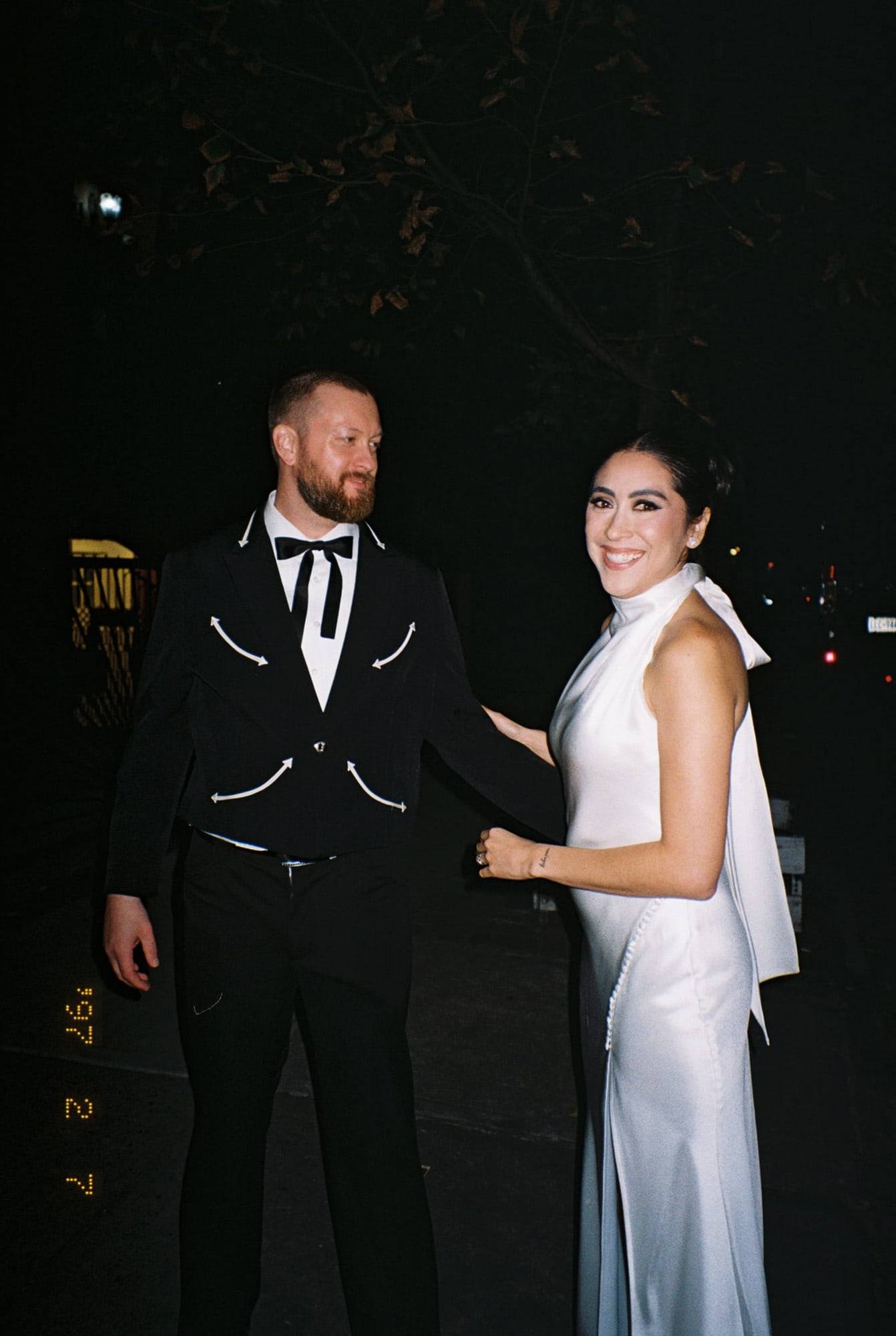 Night portrait in white and black tie