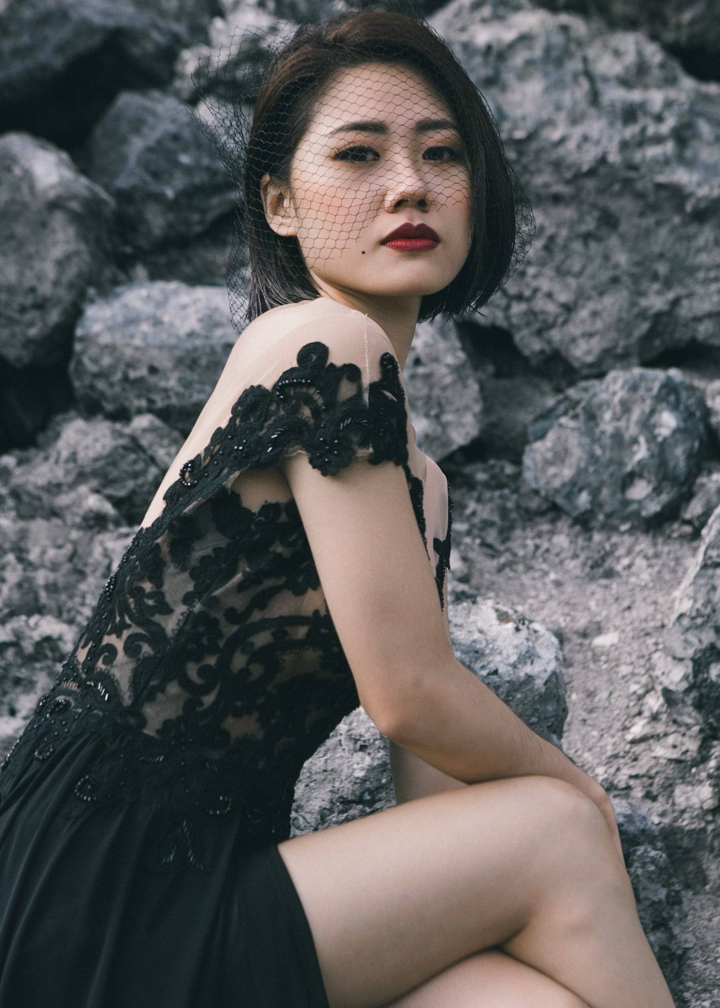 Dramatic black-gown portrait