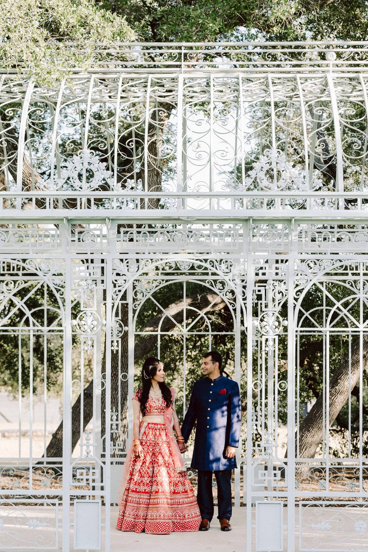Couple in the white iron gazebo